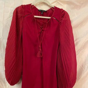 Red, laced up tunic